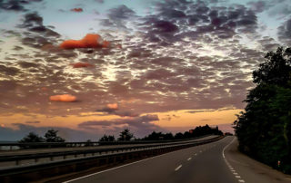 empty roadway at sunset